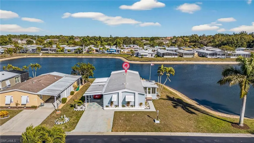 Aerial view of residential area with a nearby body of water