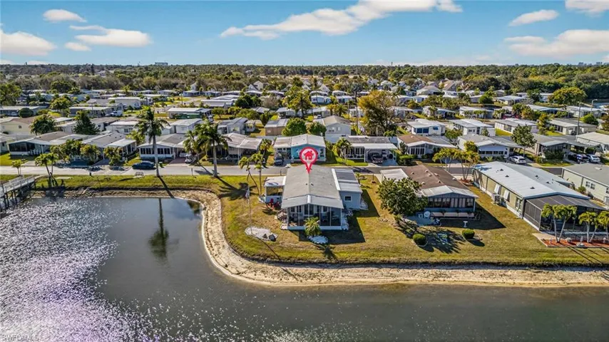 Aerial view of residential area with a nearby body of water