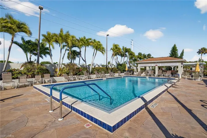 Community pool with a patio area
