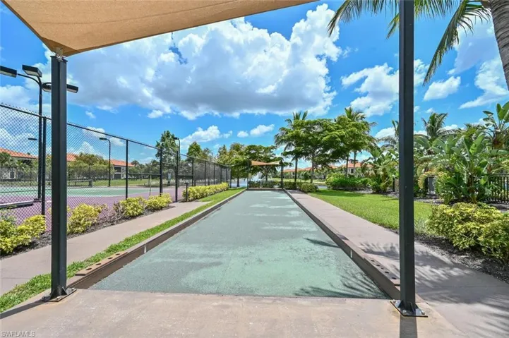 View of home's community featuring a bocce ball area