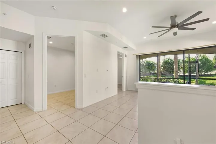 Spare room with light tile patterned floors, recessed lighting, and a ceiling fan