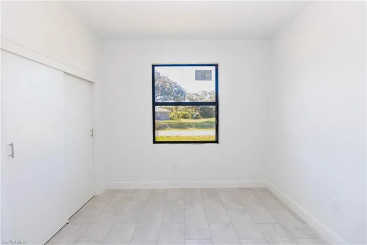 Spare room with baseboards