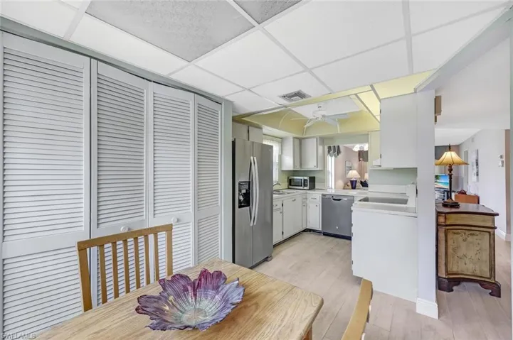 Laundry behind bifold doors.