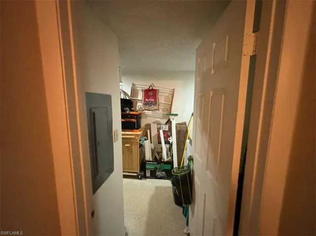 Hall featuring carpet