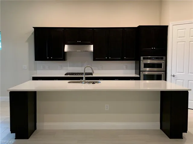 9108 Snowy Owl Way, Naples, Florida 34120