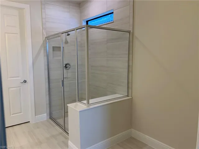 9108 Snowy Owl Way, Naples, Florida 34120