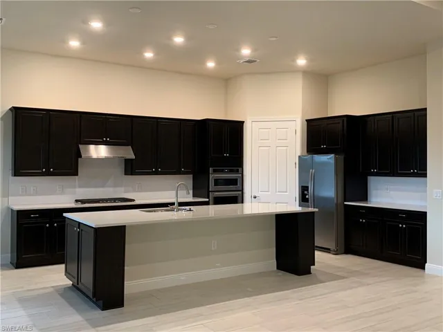 9108 Snowy Owl Way, Naples, Florida 34120
