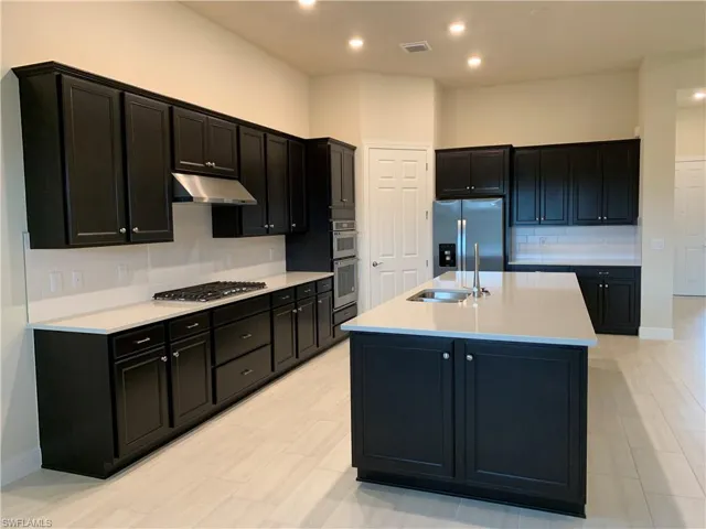 9108 Snowy Owl Way, Naples, Florida 34120