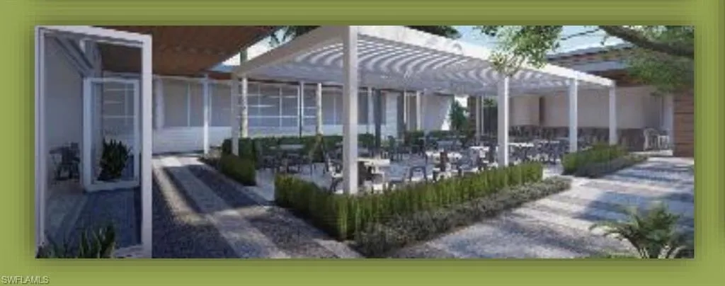 Open Dining area with mechanical roof shutters for protection from the weather, entrance to interior dining area, and bar