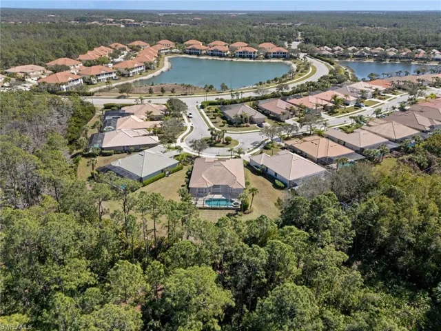 Aerial view of residential area with a large body of water
