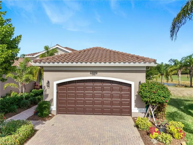 View of front of property with a garage