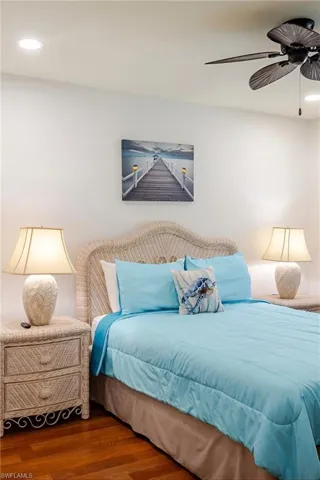 Bedroom featuring wood finished floors, recessed lighting, and ceiling fan