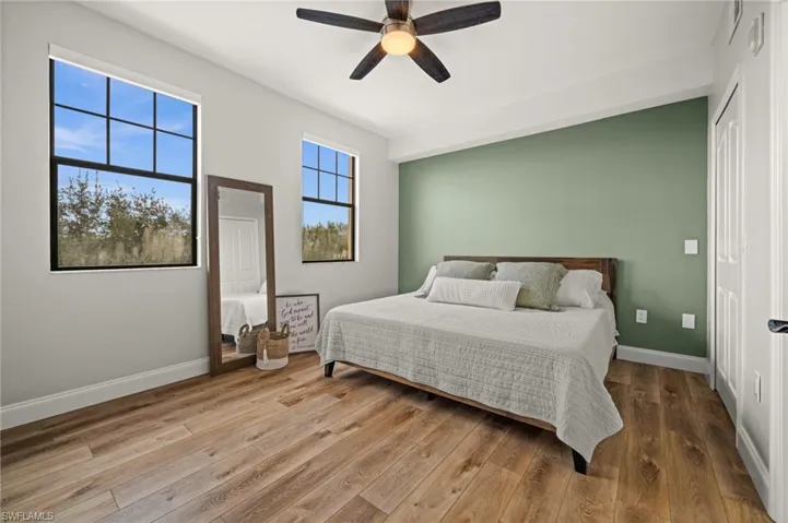 Large sunny & bright master w/ walk in closet