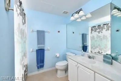 Bathroom with vanity, a shower