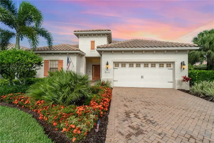 Mediterranean home featuring a garage