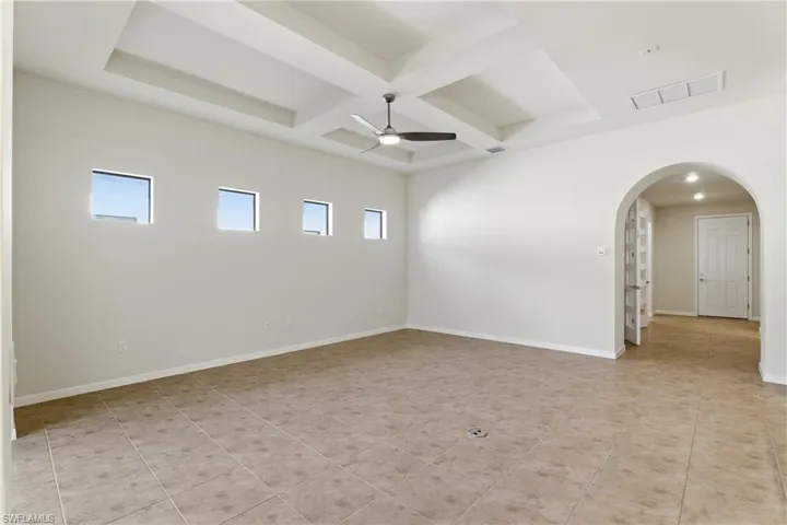 Living room with tray ceiling details