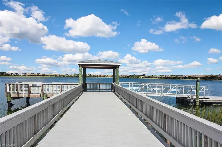 Dock with a gazebo and a water view