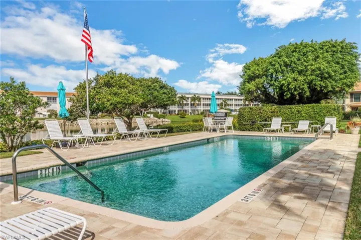 Community pool featuring a patio area