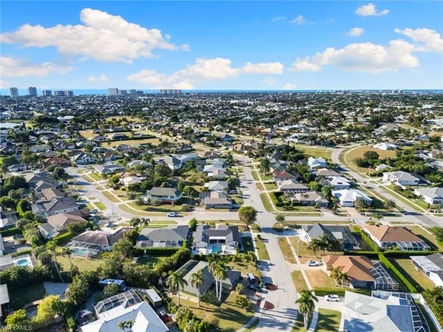 Aerial view of property and surrounding area with nearby suburban area and nearby urban area