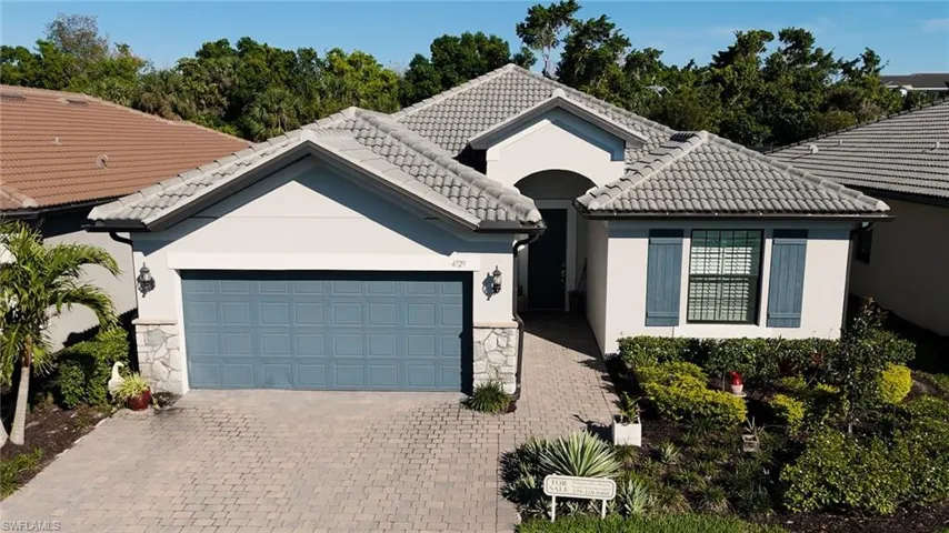 View of front of home with a garage
