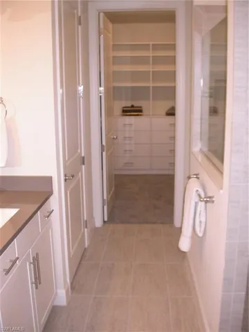 Bathroom featuring vanity and tile patterned floors