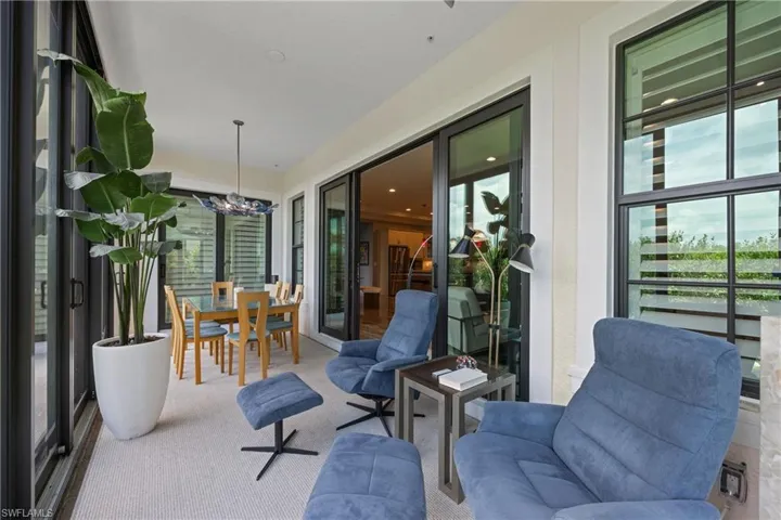 IMPACT GLASS enclosed Lanai with FLOOD BARRIER included with purchase!