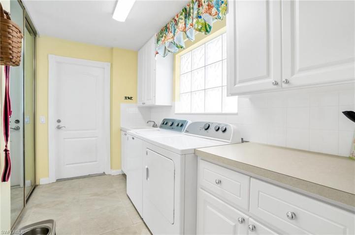 Tons of storage & laundry sink