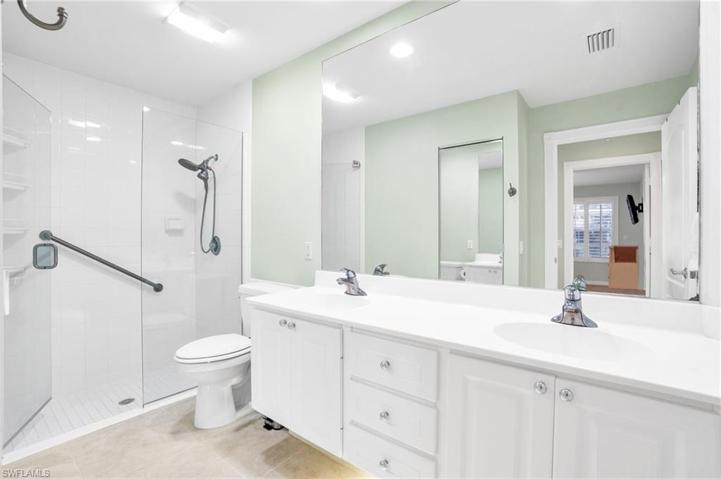 Large bath and frameless shower door