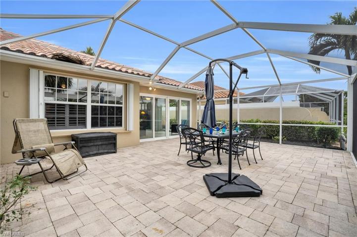 Extended paver patio Super screen CLEAR views & hurricane shutters
