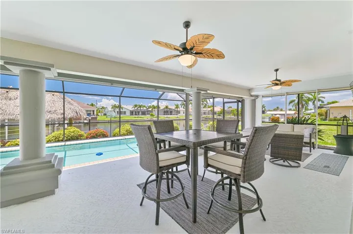 Sunroom with ceiling fan and plenty of natural light