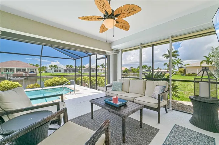 Sunroom featuring ceiling fan