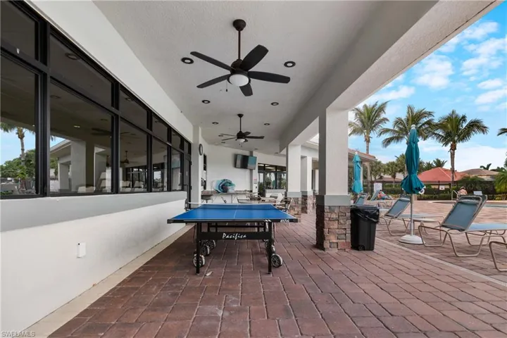 View of patio with ceiling fan
