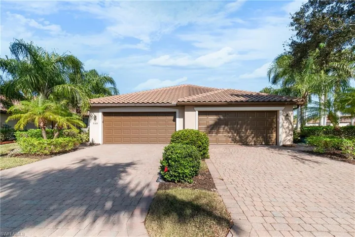 Mediterranean / spanish-style house featuring a garage