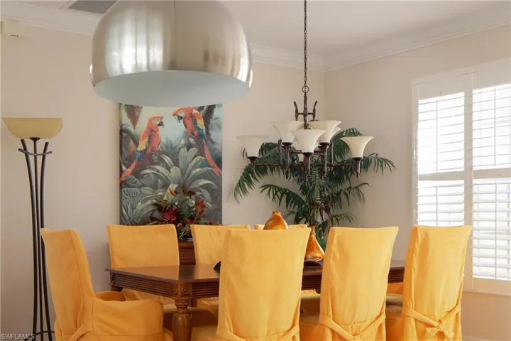 Dining room featuring ornamental molding
