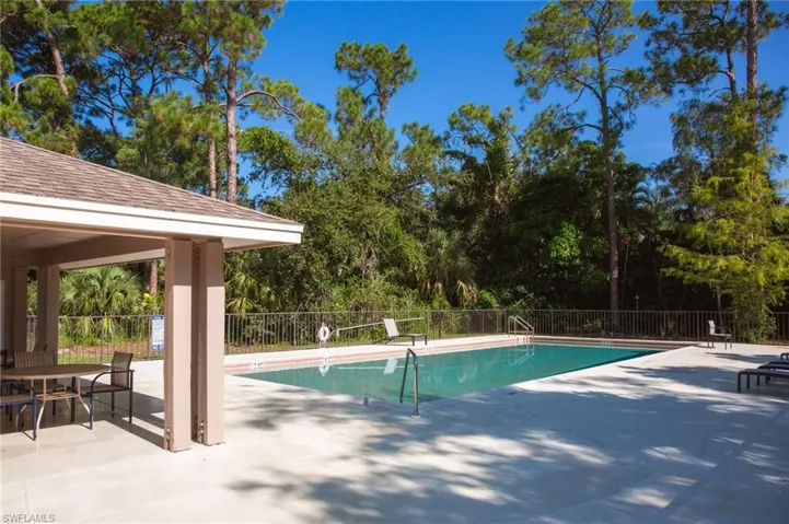 View of pool with a gazebo and a patio