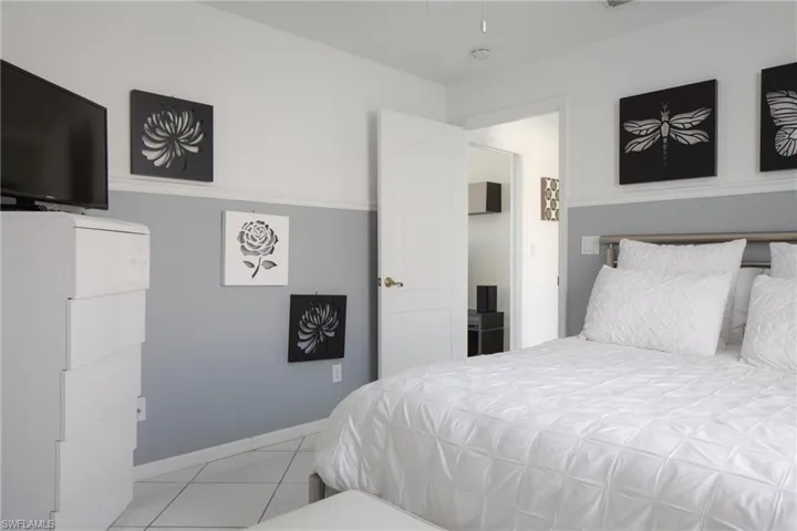 Bedroom featuring light tile patterned floors