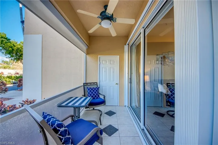 Storage Unit, Ceiling Fan and Hurrican Accordian Shutters on Patio