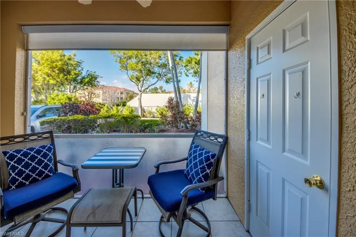 Nice Roll down shade, Storage Closet and comfortable seating on patio