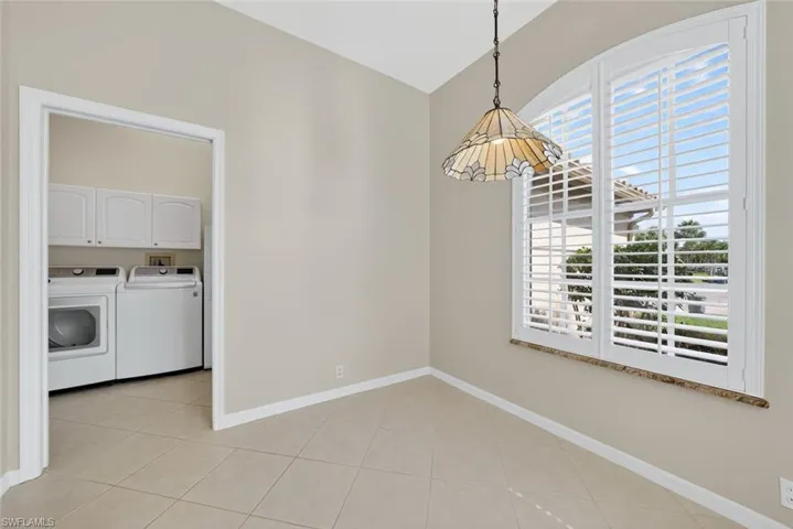 Breakfast nook off the kitchen and laundry room