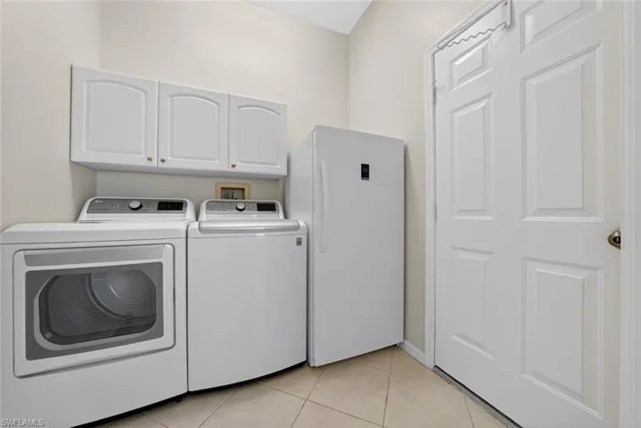 Laundry room with refrigerator/Freezer