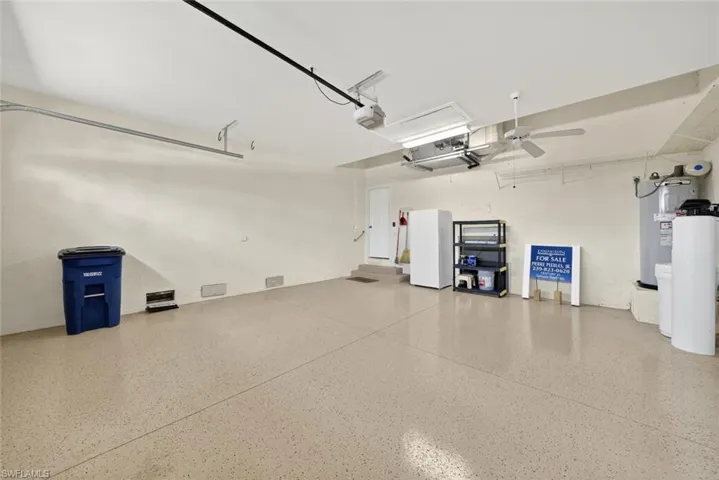 2 car Garage with an epoxy painted floor.