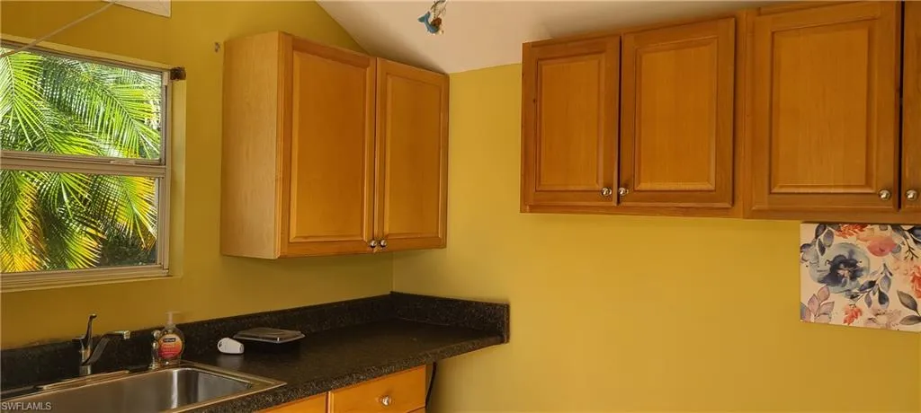 Laundry area with a sink