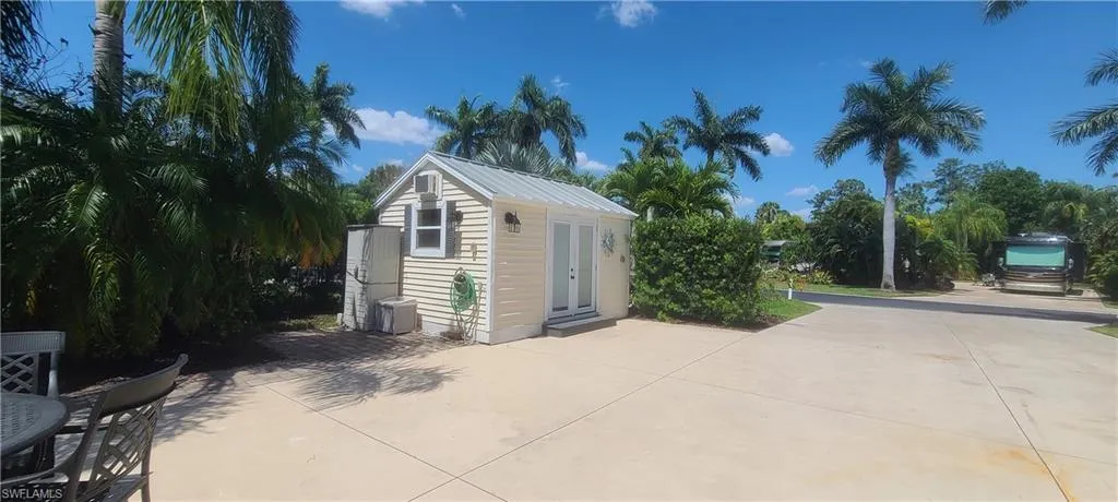 View of outdoor structure featuring an outbuilding