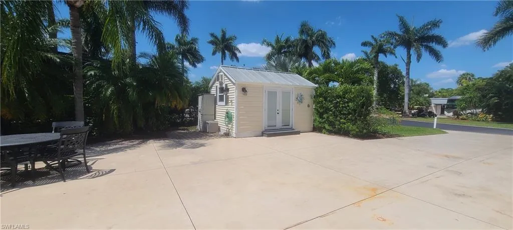 View of shed featuring outdoor dining space