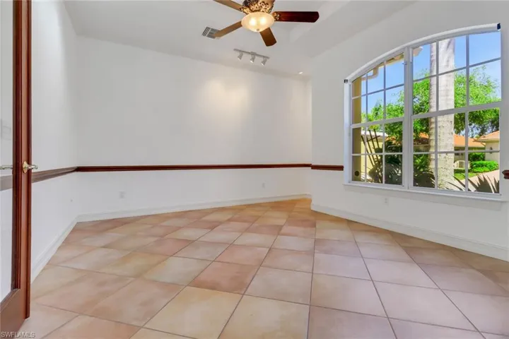 Large bonus room off entry would make a perfect office or den.