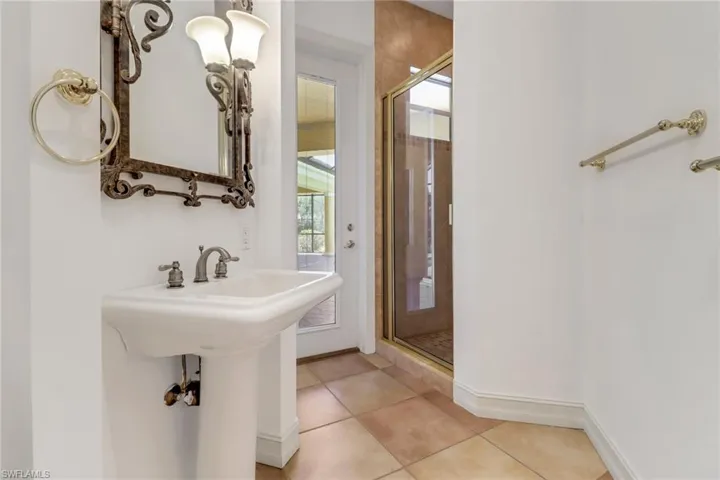 Full bath with direct outside access to pool.