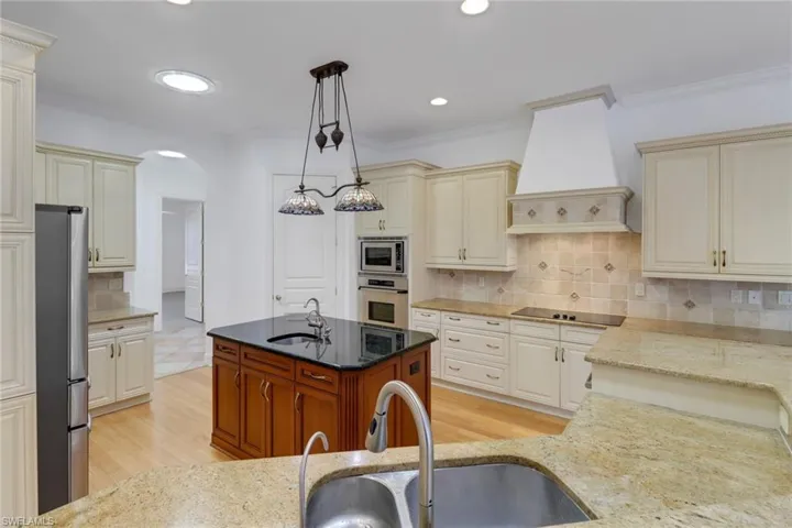 Lots of cabinet space in these beautiful custom built 17 layer lacquer cabinets.