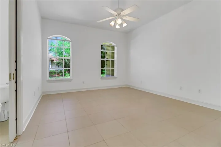 Large bedroom with private attached bath.