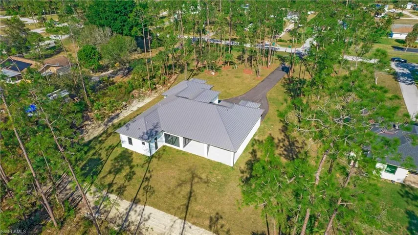 Aerial view of property and surrounding area