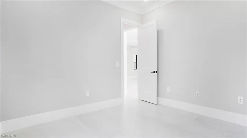 Empty room with baseboards